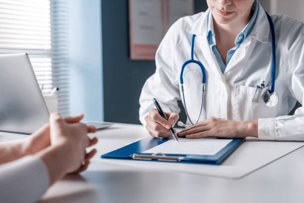 Consultant radiologist reviewing scans